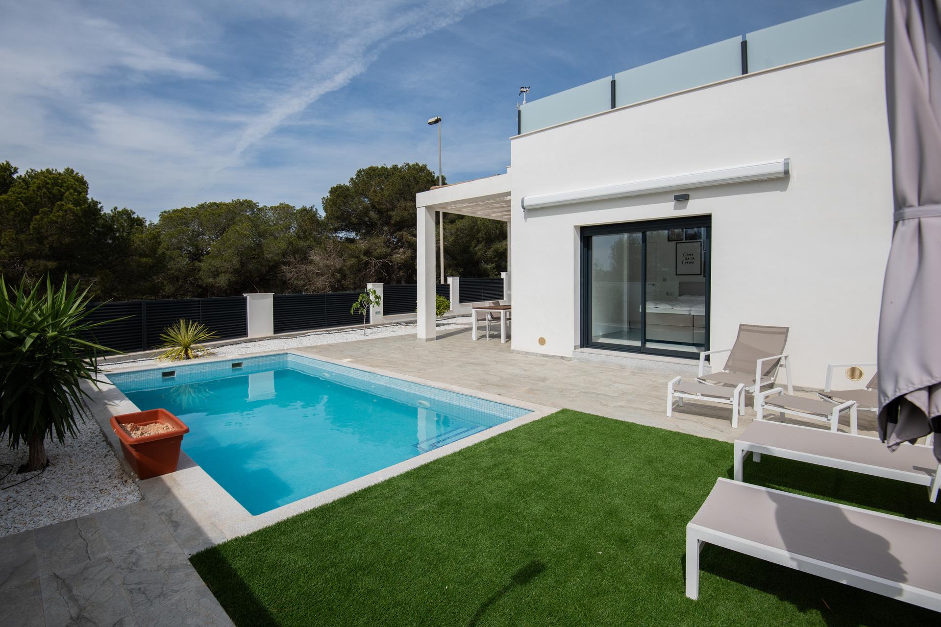 Garden level viewed from solarium terrace, new-build villa, Pinar de Campoverde