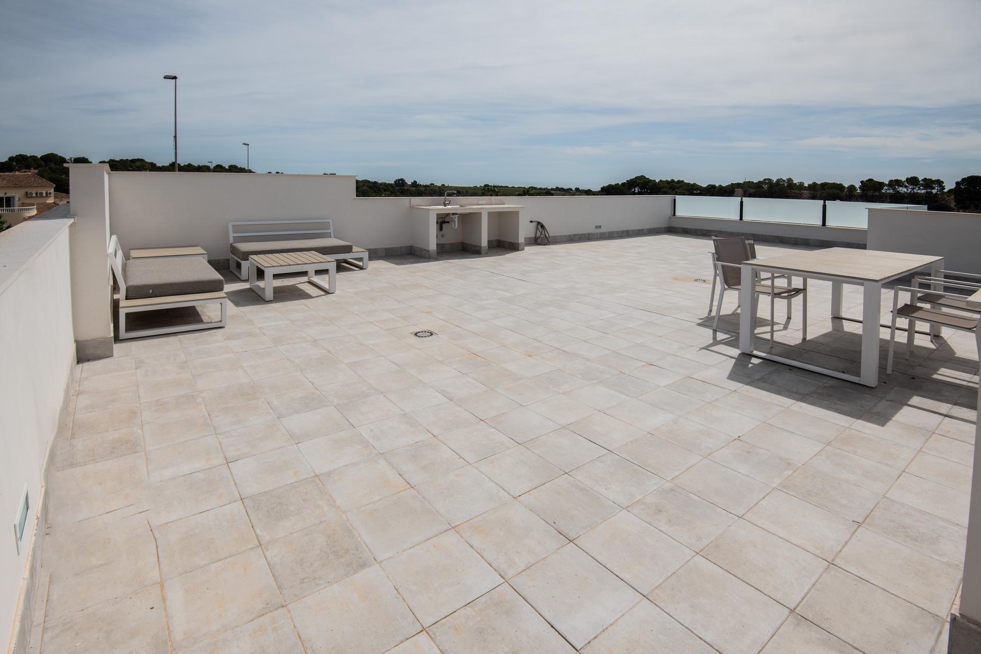 View from within plot towards surrounding residential area, Pinar de Campoverde