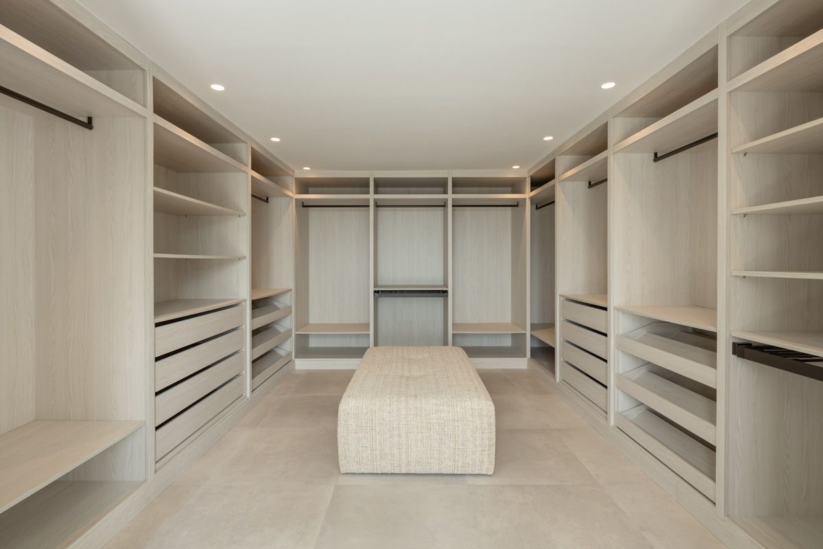 Covered terrace with lounge furniture in new-build villa, La Zagaleta-El Madroñal