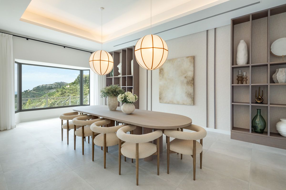 Living room with floor-to-ceiling glass panels overlooking grounds, new-build villa, Benahavis