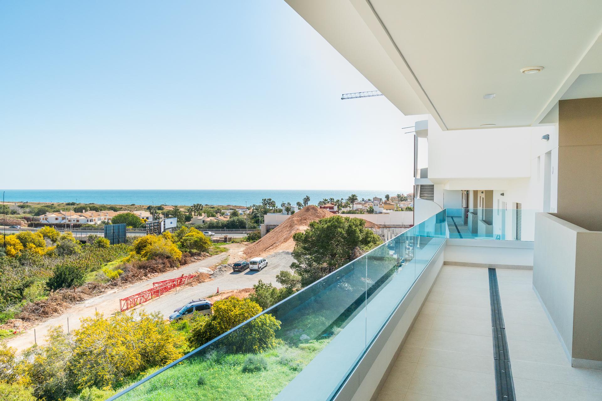 Open-plan living and dining area in 101m2 new-build apartment, La Zenia