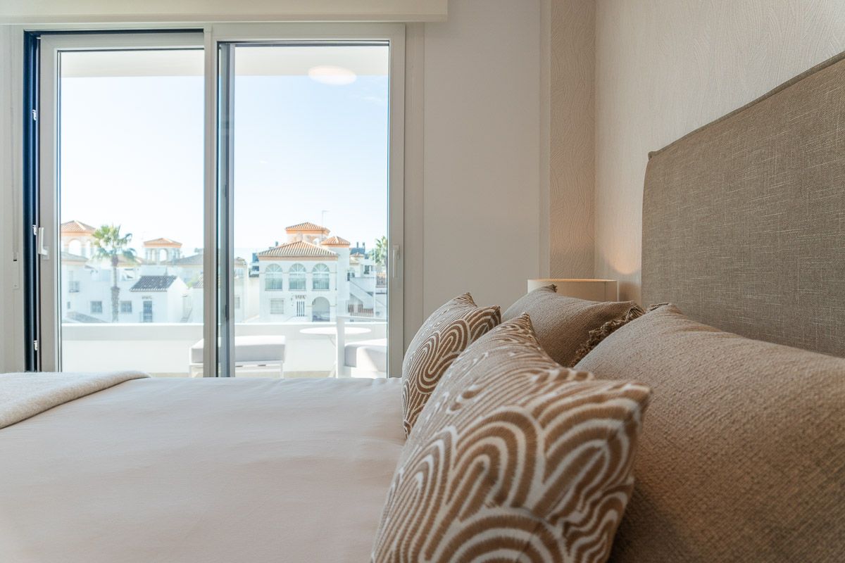 Upper-level shared roof space in La Zenia apartment development
