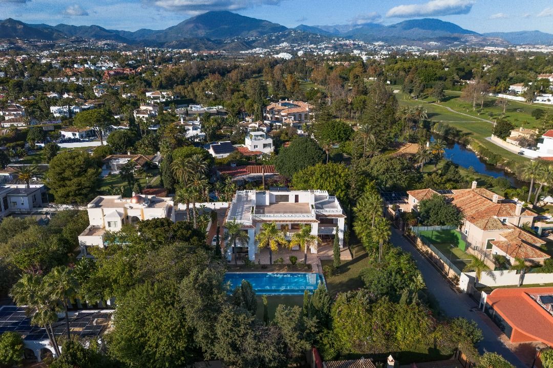 Garden and pool viewed from covered terrace, Casasola, Estepona