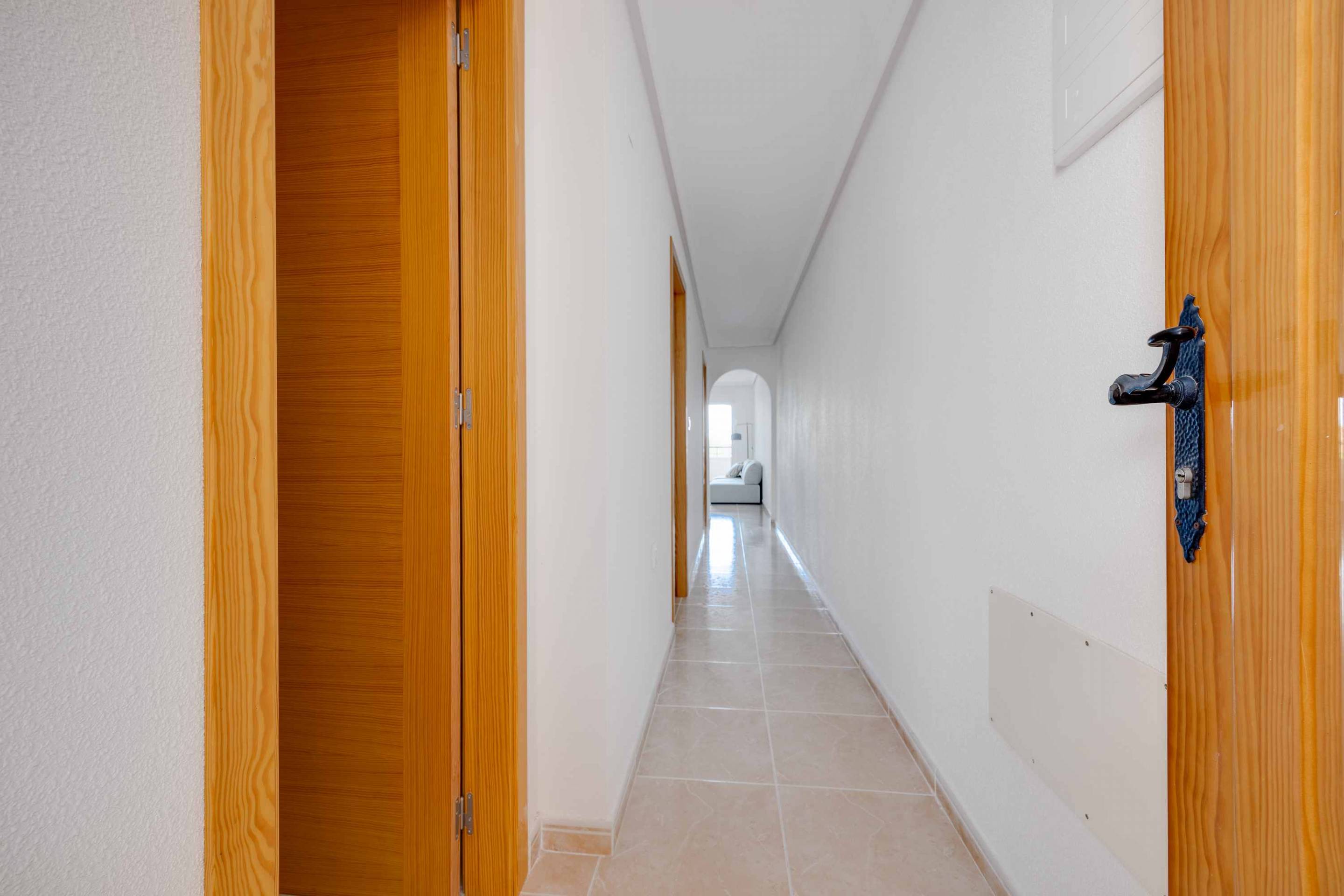 Bathroom with basin, mirror and wall tiling, new-build apartment, San Fulgencio Pueblo
