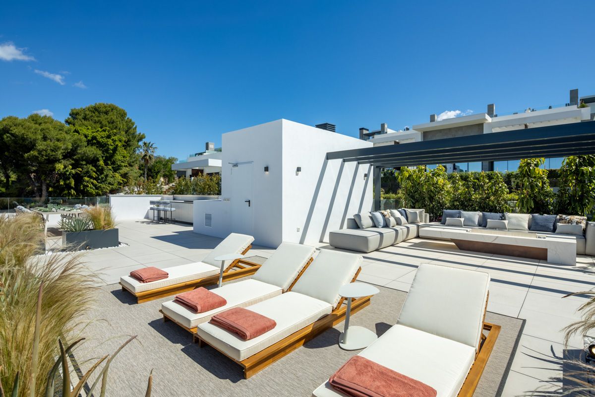 Covered terrace adjacent to pool in new-build villa, Bello Horizonte