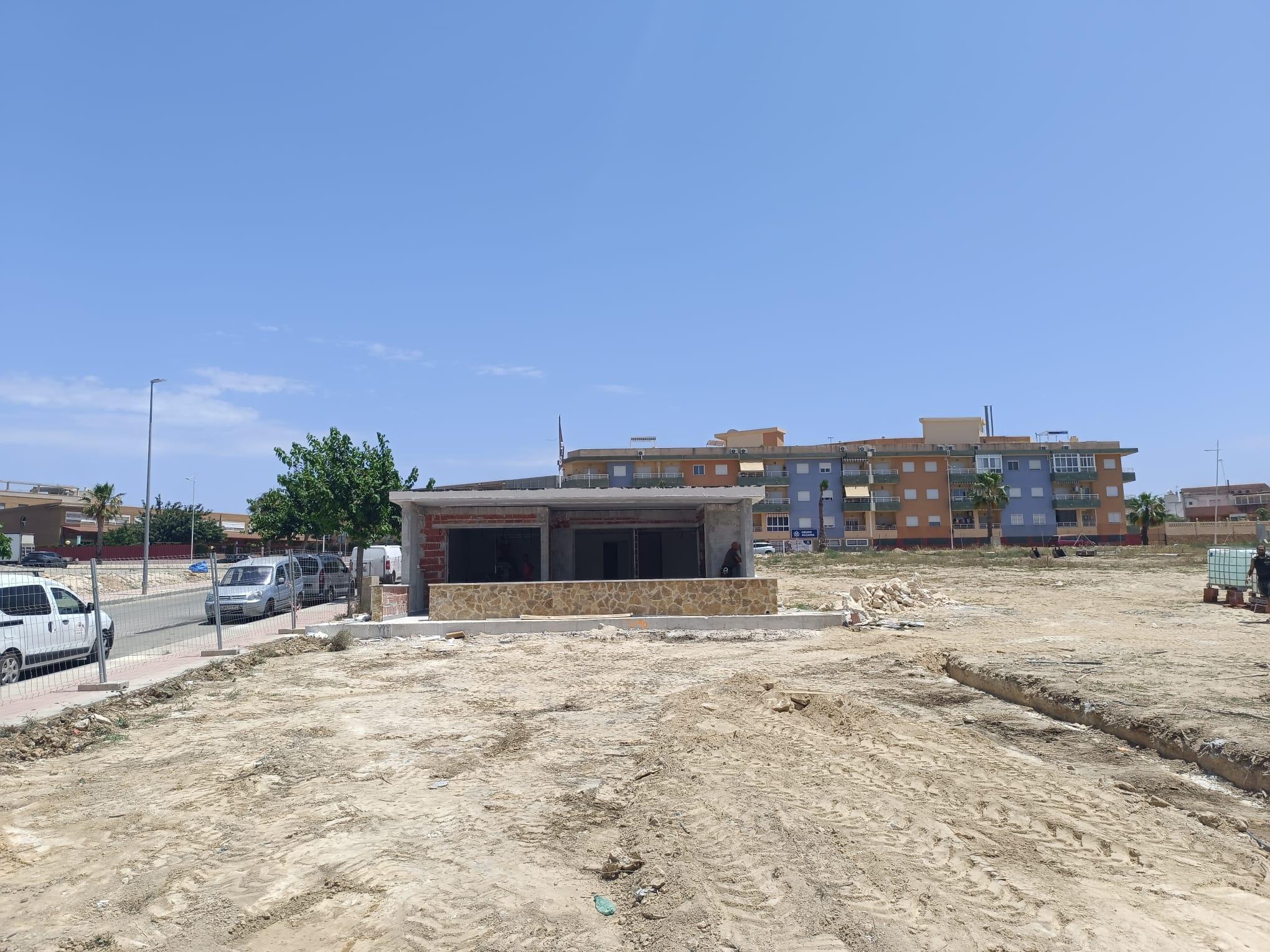 Evening exterior of residential complex, Pueblo 9, San Miguel