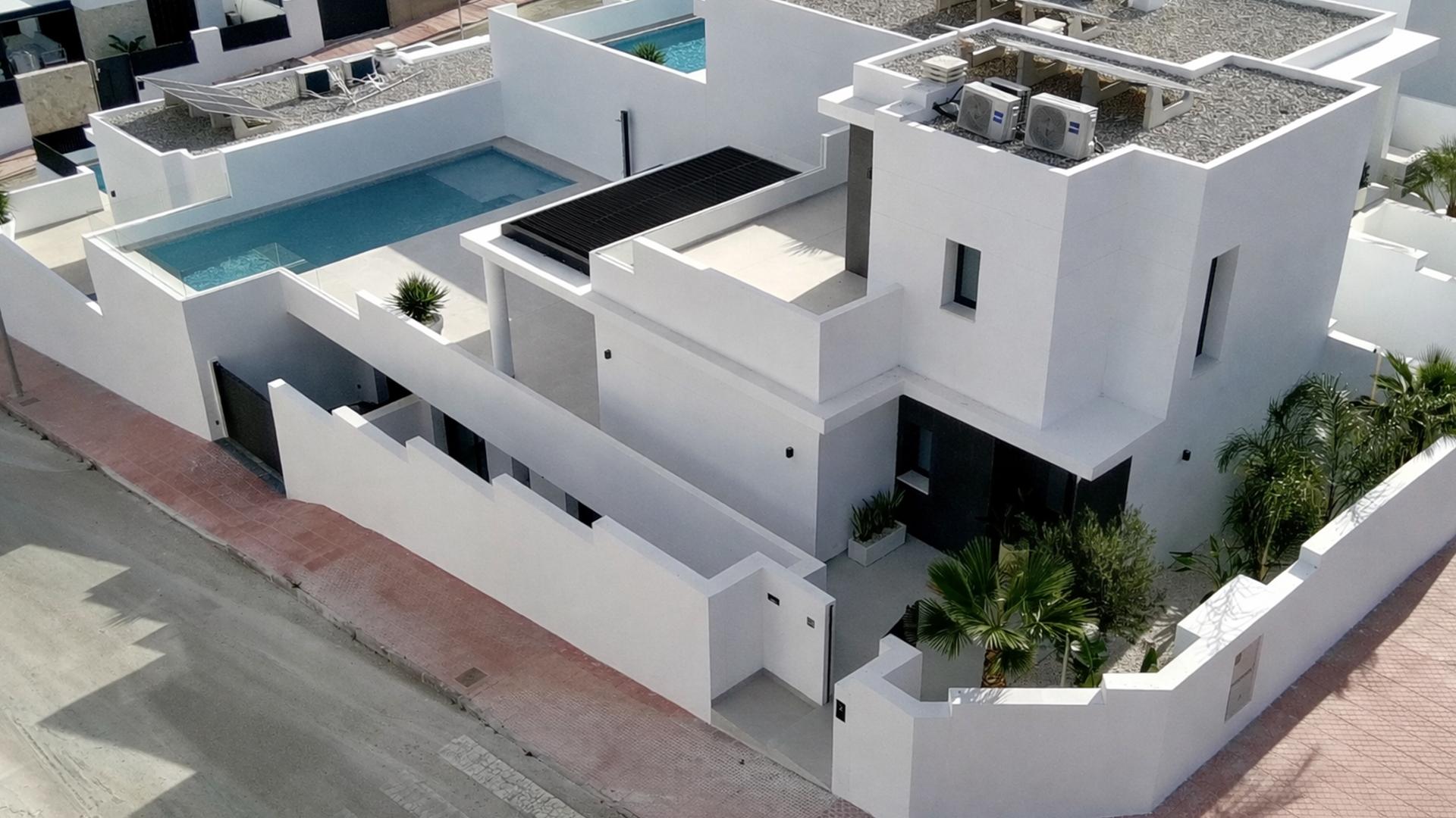 Living area with air conditioning unit visible in new-build villa, Ciudad Quesada