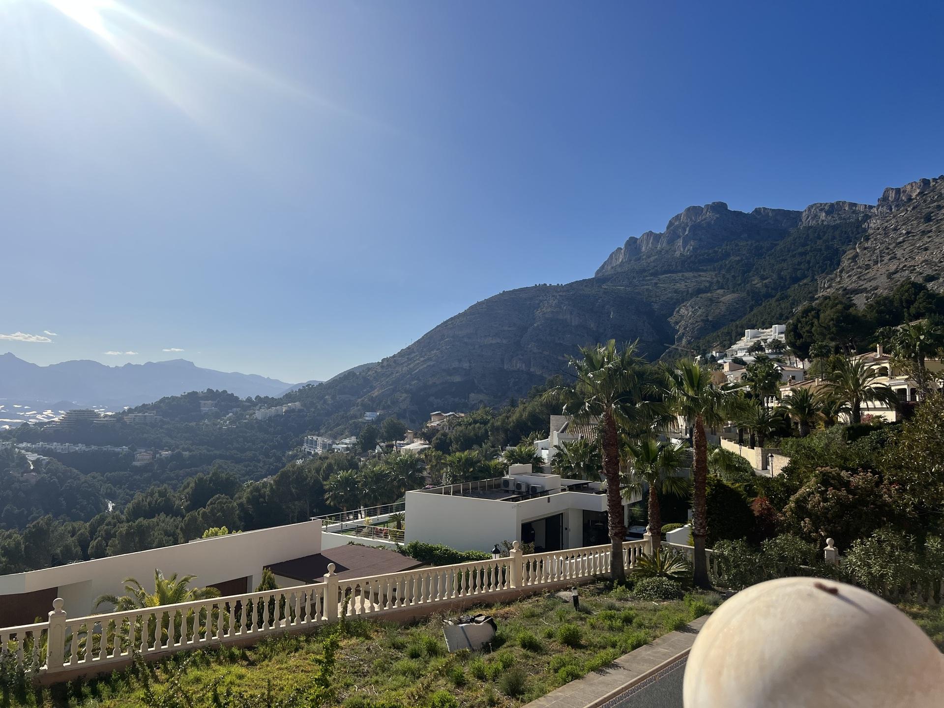 Rear garden with planting and paving at 4-bedroom new-build villa, Altea Hills