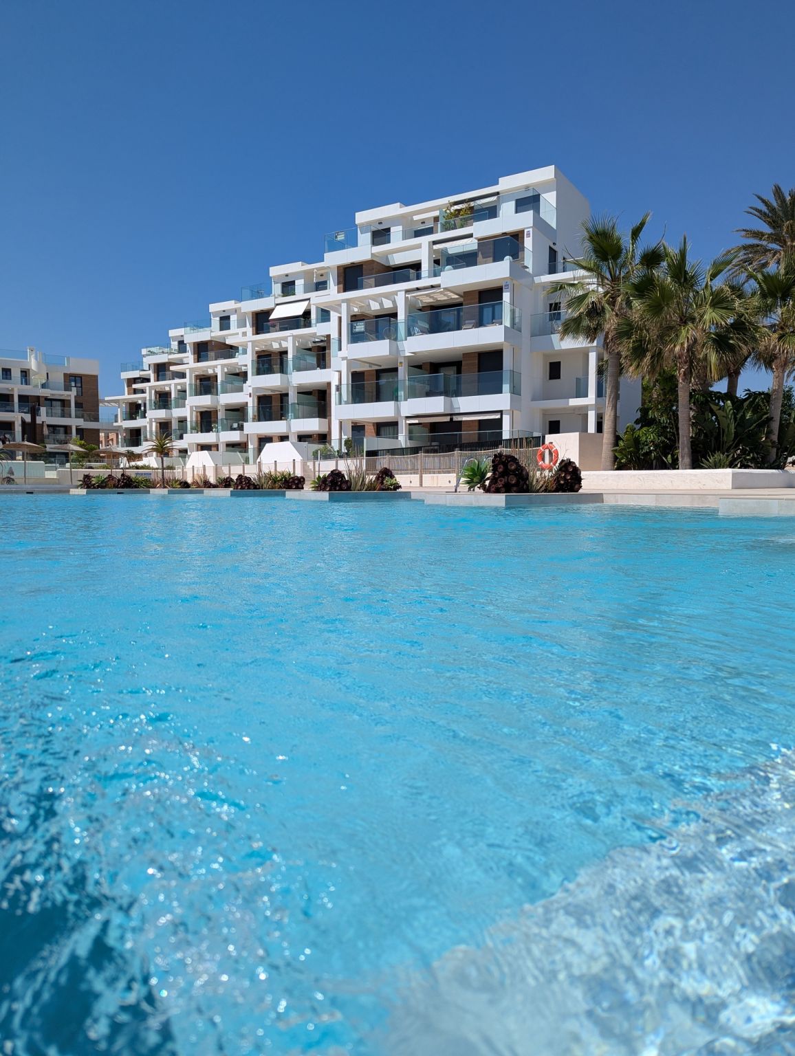 Underground parking area in residential complex, L'Almadrava-L'Estanyò, Denia