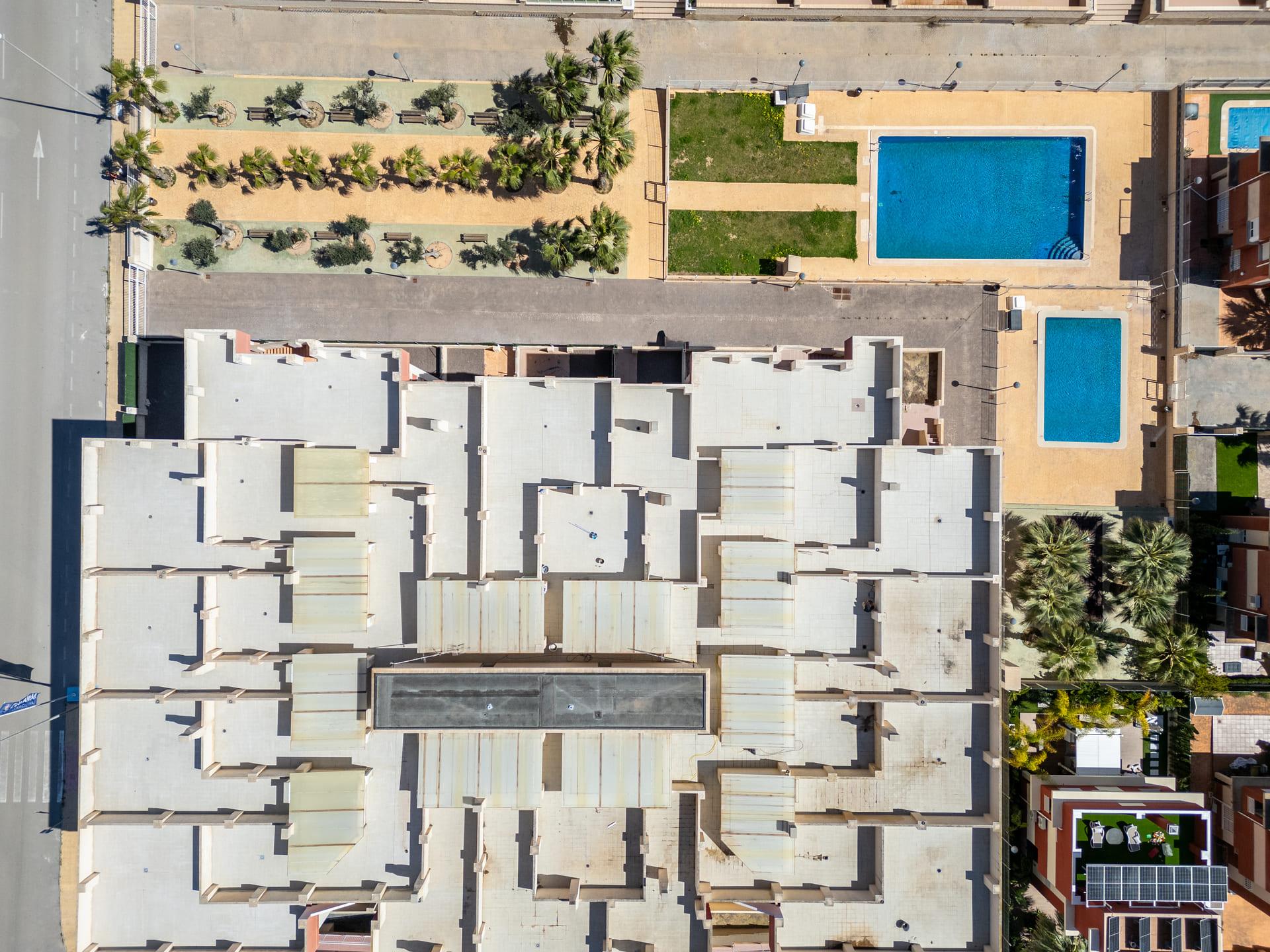 New-build complex exterior showing landscaped grounds, Lomas de Cabo Roig, Orihuela Costa