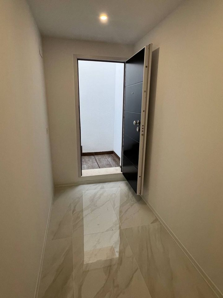 Internal hallway with tile flooring, new-build villa in Desamparados