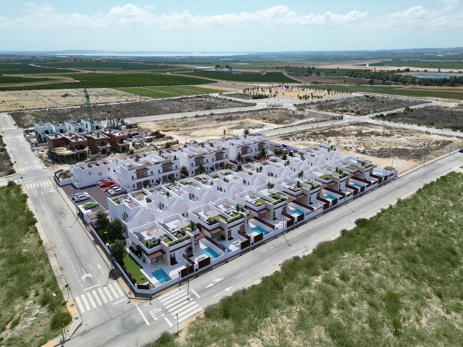 Communal swimming pool area in new-build residential complex, Desamparados, Orihuela
