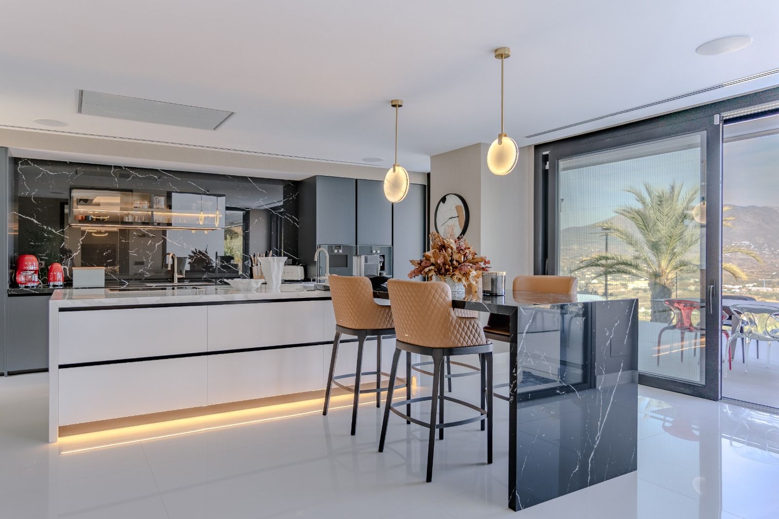 Roof terrace solarium with outdoor seating at villa, La Cala Golf