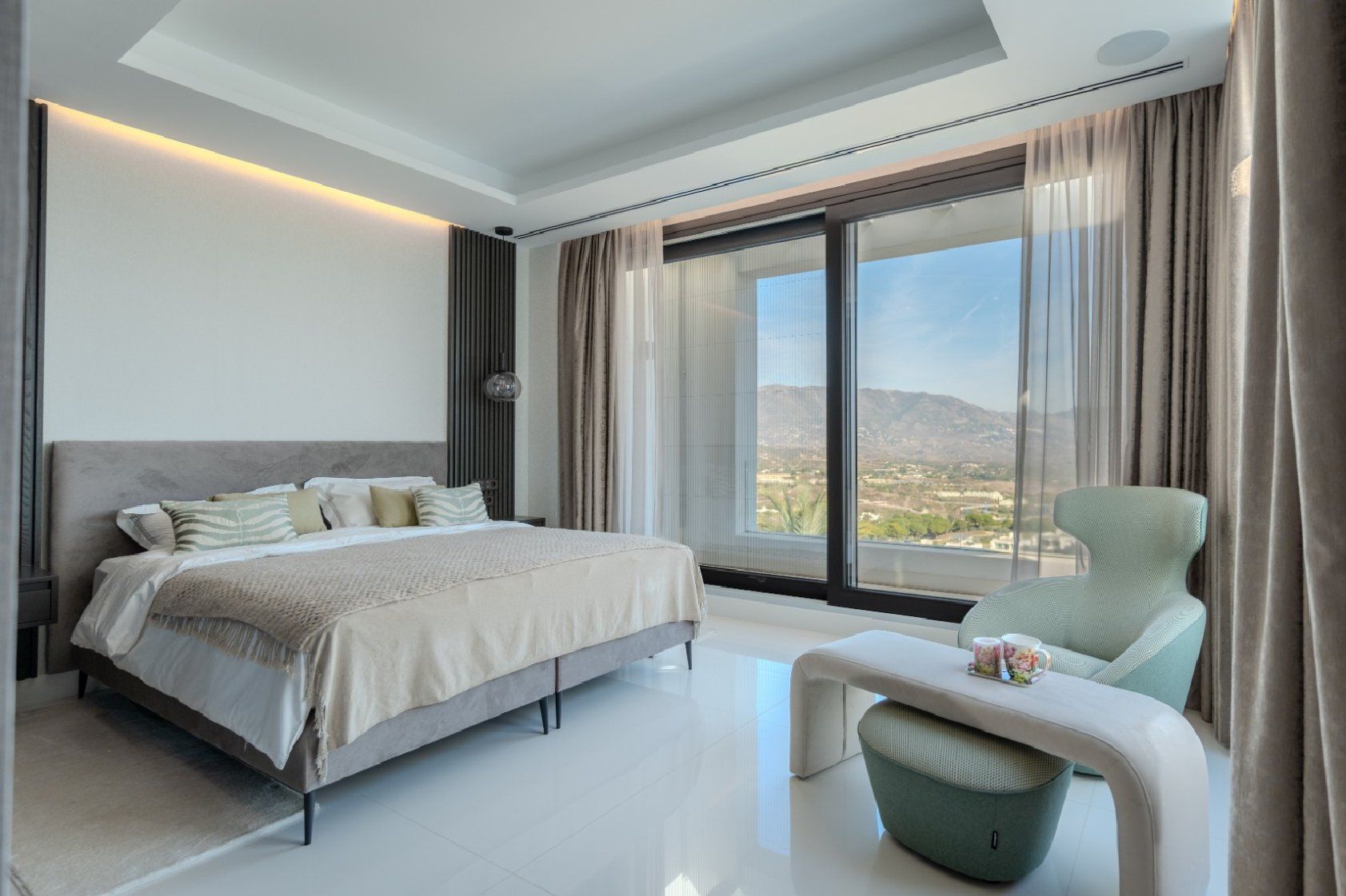 Living room with large glazed doors opening to terrace, La Cala Golf villa, Mijas