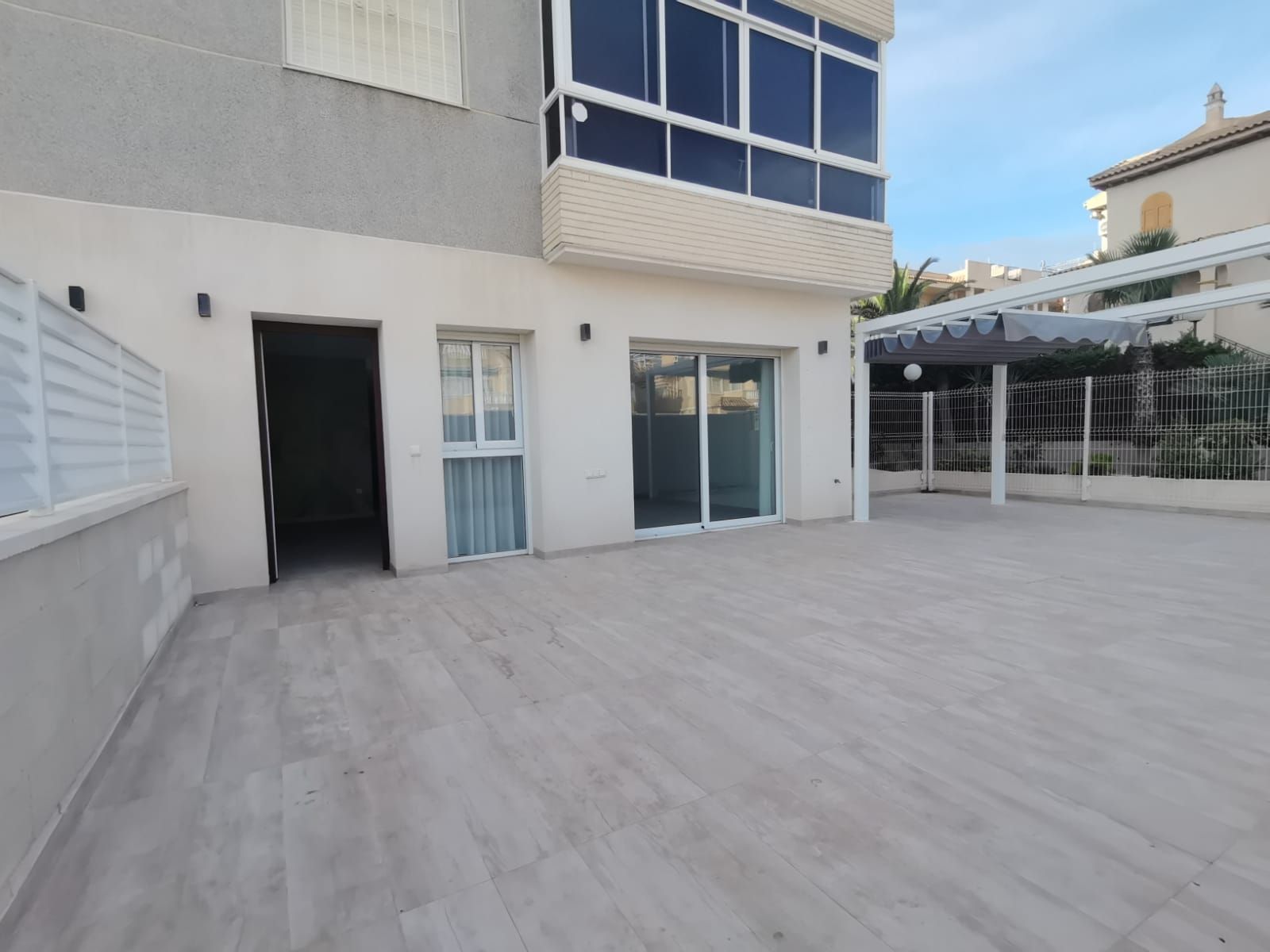 Outdoor pool tiles and water, Torreblanca residential complex