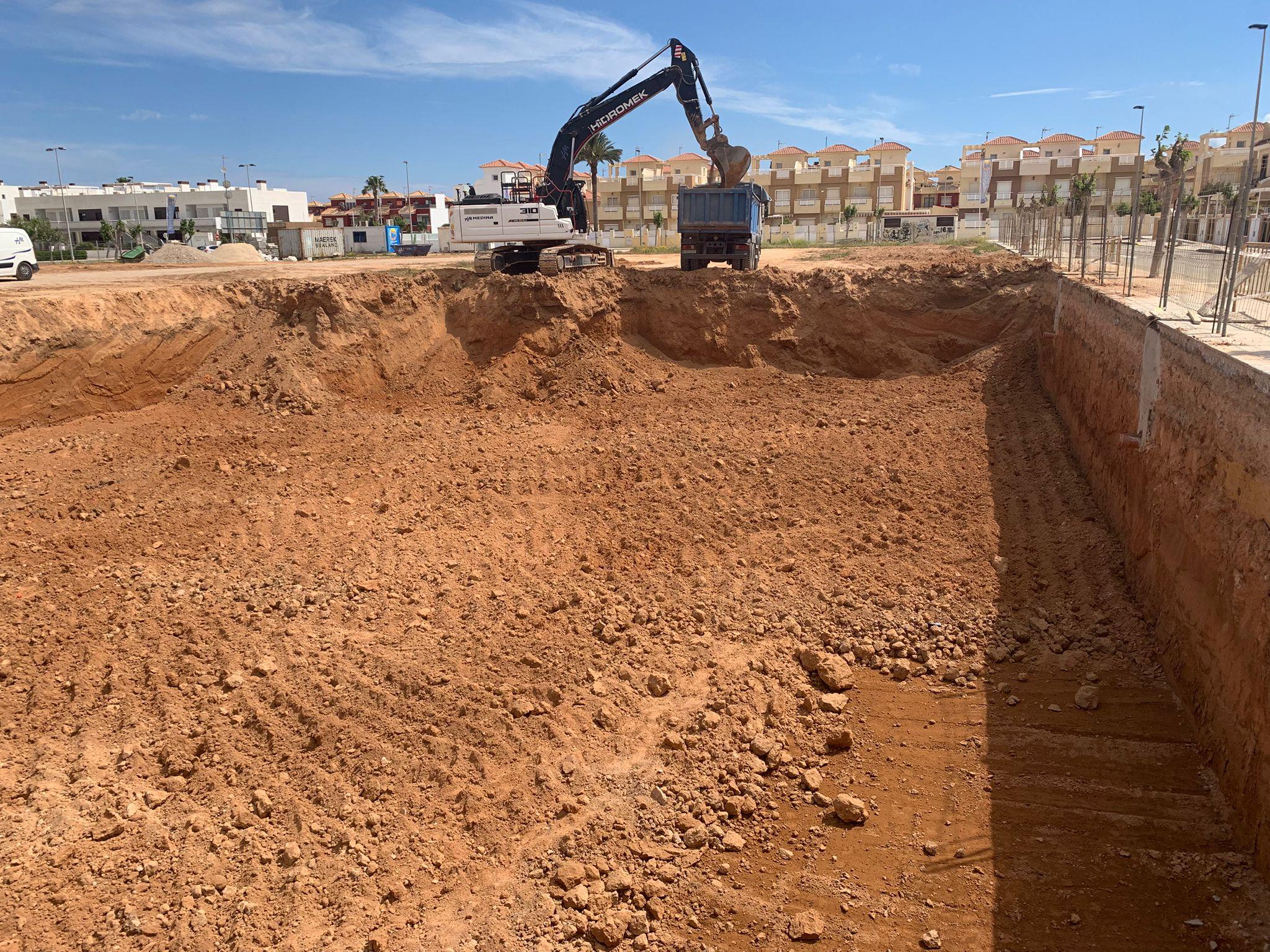 Covered garage parking area within new-build development, La Torre de la Horadada