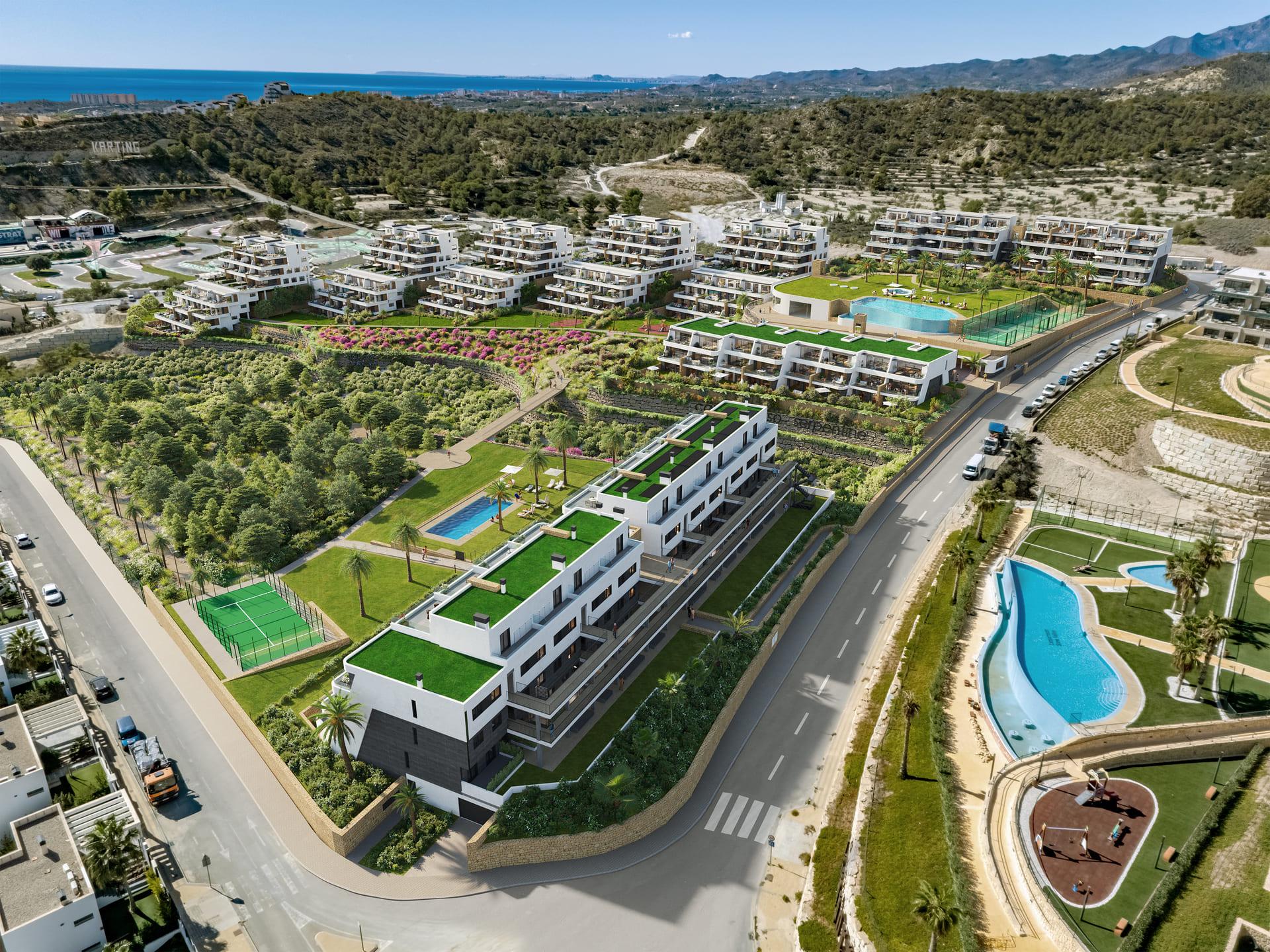 Communal garden path and planted borders, Camporrosso Village, Finestrat