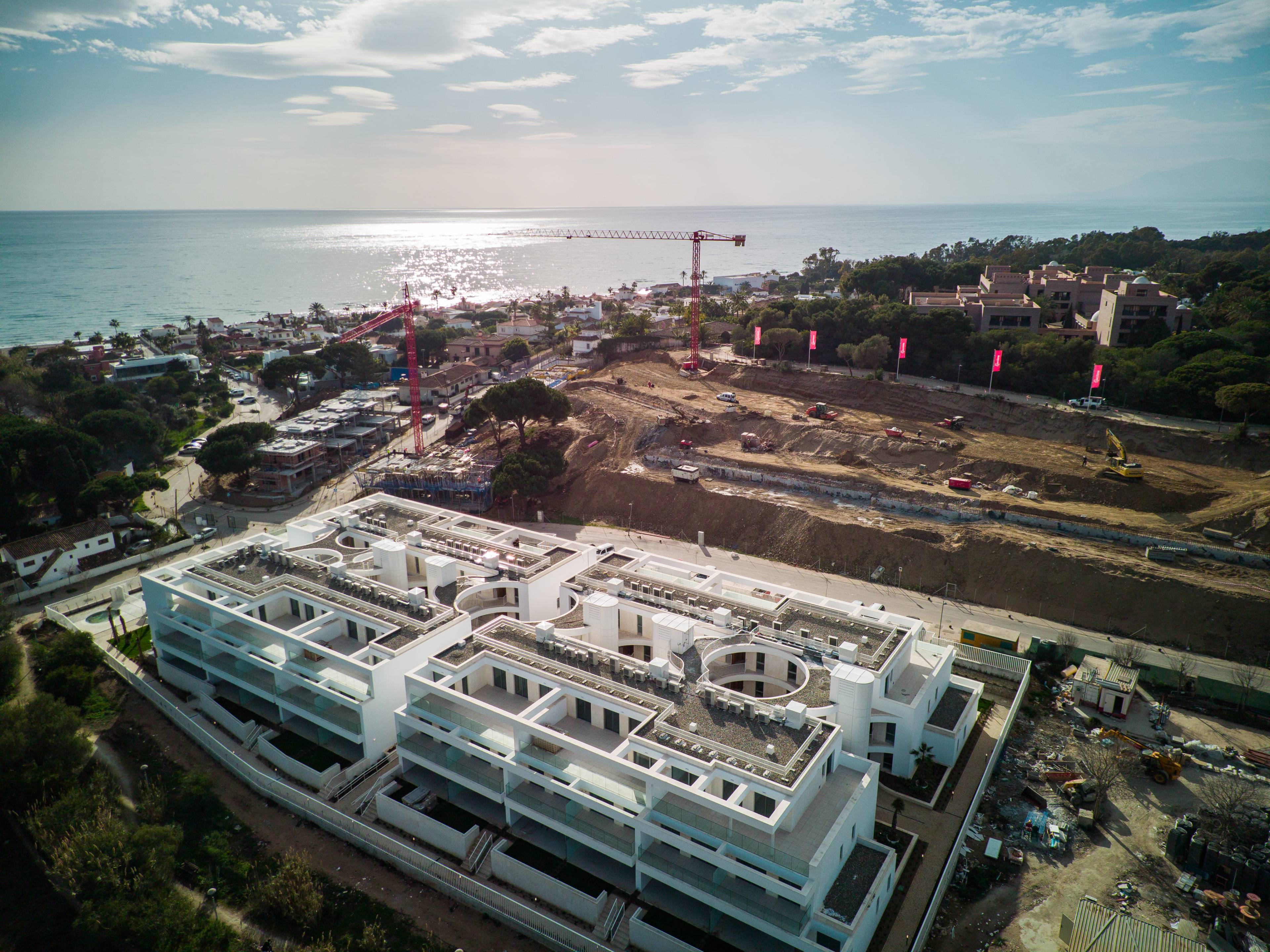 Aerial or elevated view of new-build townhouse complex, Real de Zaragoza, Marbella