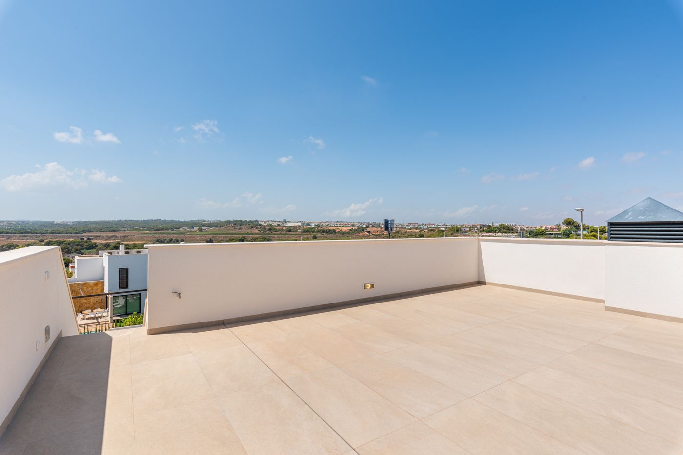 Open-plan living and dining area with floor-to-ceiling glazing, new-build villa, Campoamor