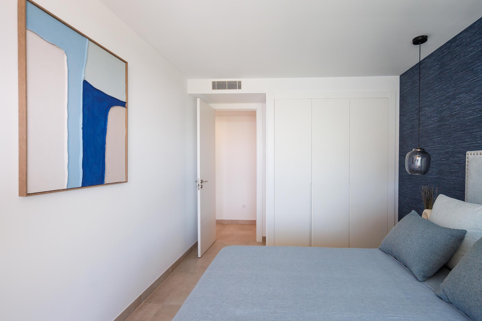 Third bedroom with built-in storage in 3-bedroom apartment, Castillo de Sohail