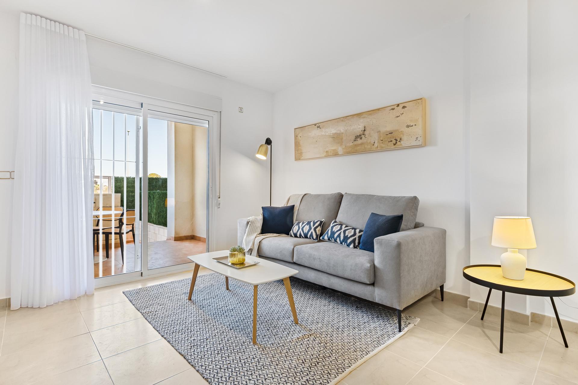 Communal garden and pool surrounds at new-build development, Lomas de Cabo Roig