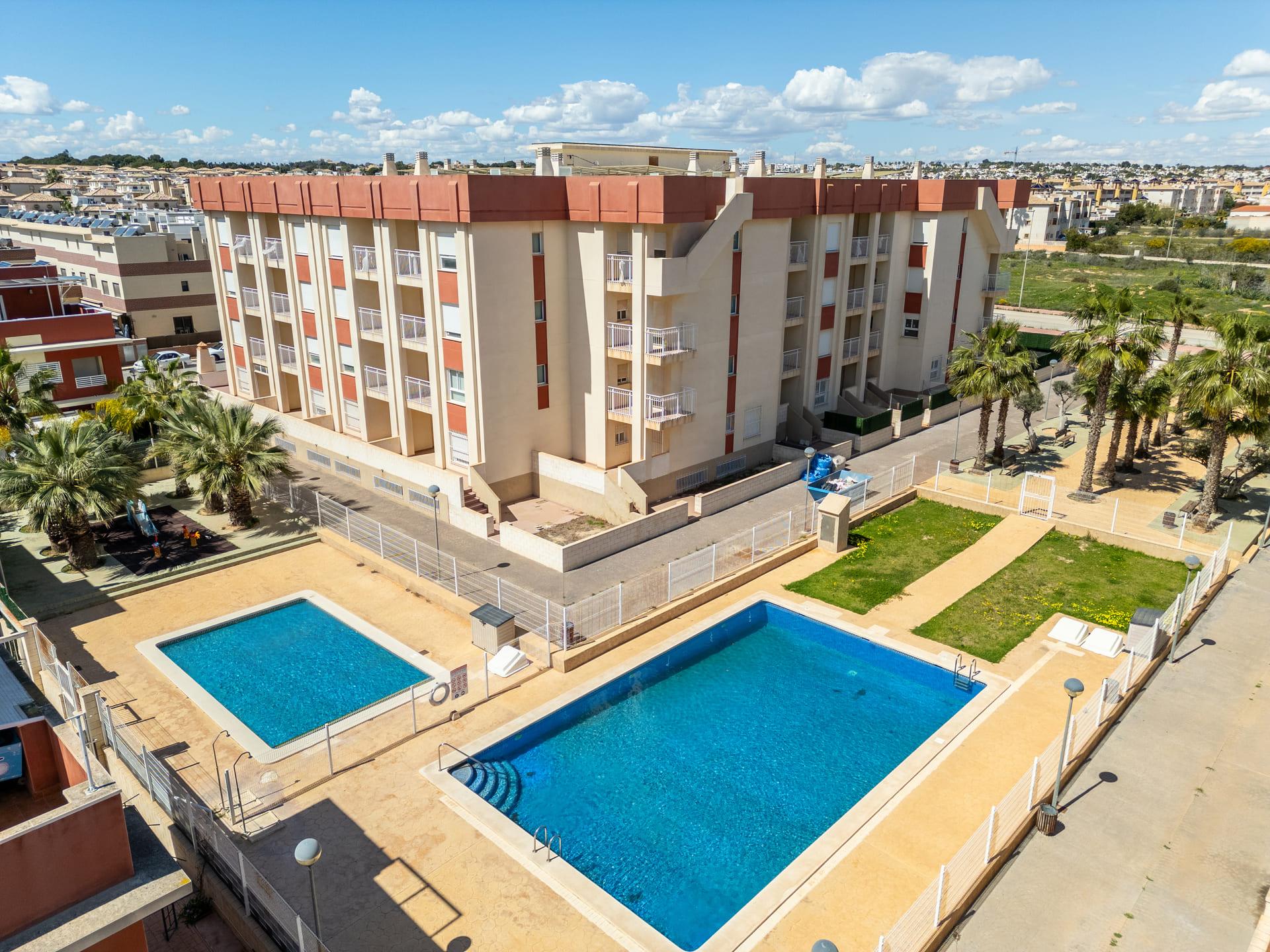 Storage cupboard off hallway in 2-bedroom apartment, Lomas de Cabo Roig