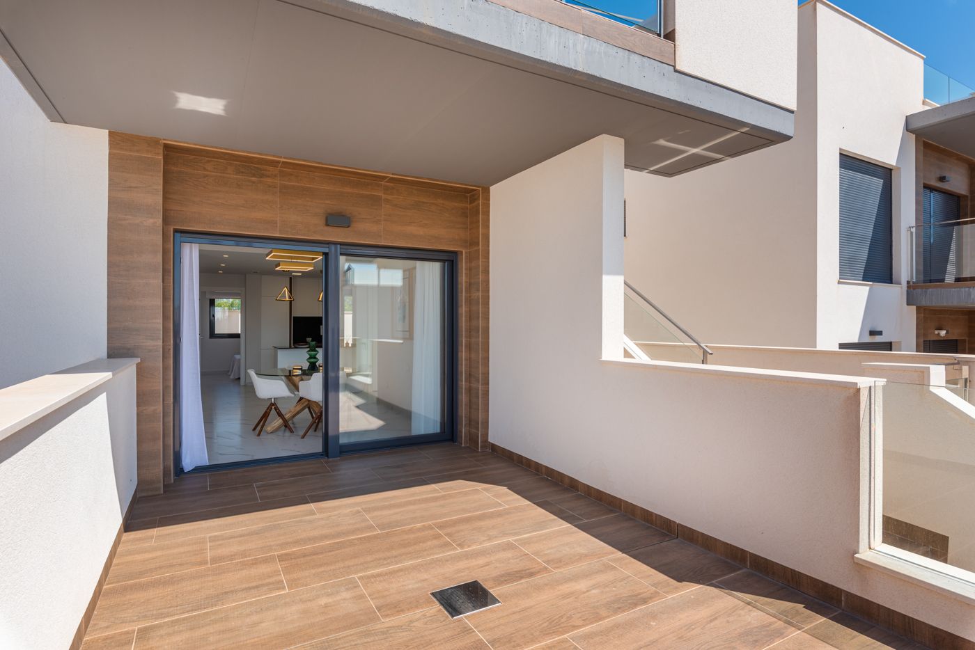 Development exterior showing upper-floor units, Cerro del Sol, San Miguel