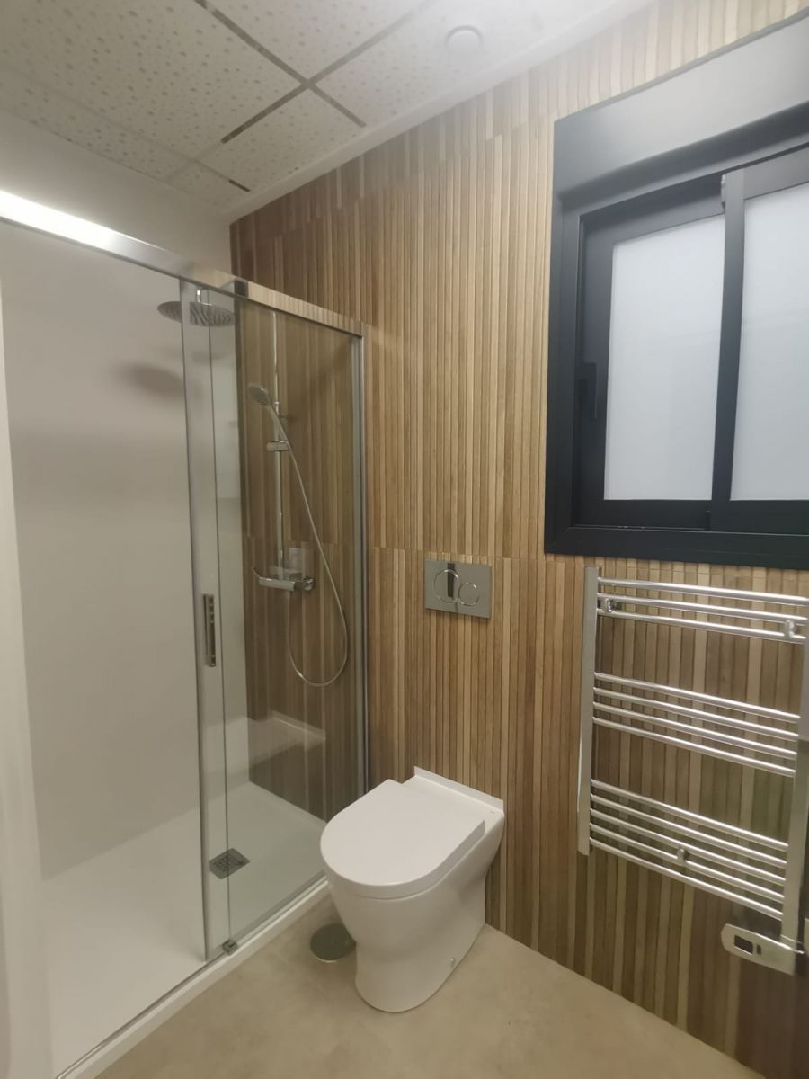 Community solarium with seating, new-build development, Centro, Torrevieja