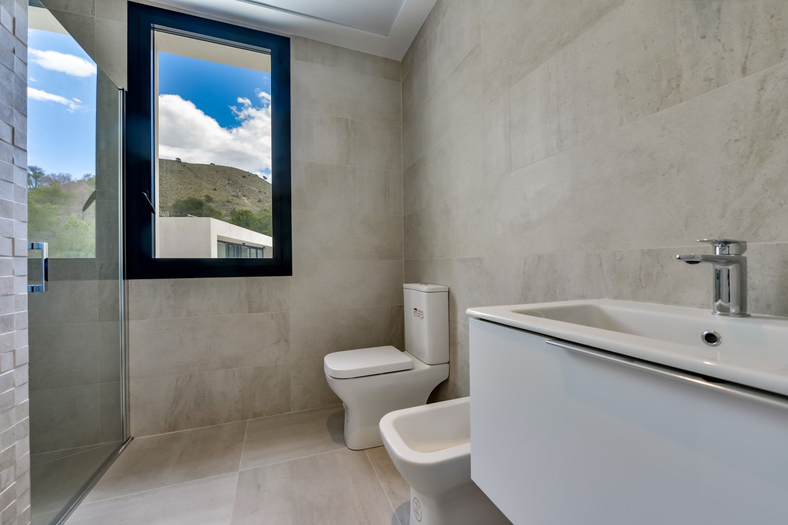 Outdoor shower area beside pool of new-build villa, Golf Bahía, Finestrat