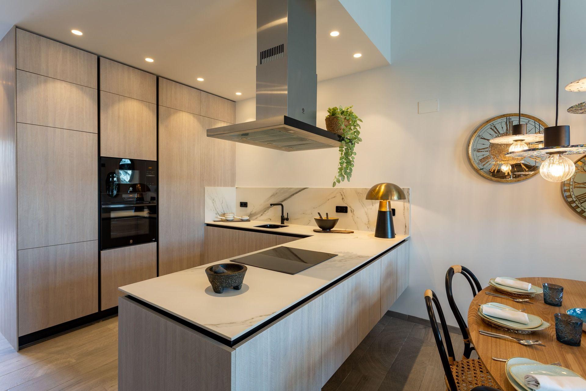 Kitchen appliances and countertop in 3-bedroom townhouse, La Finca Golf, Algorfa