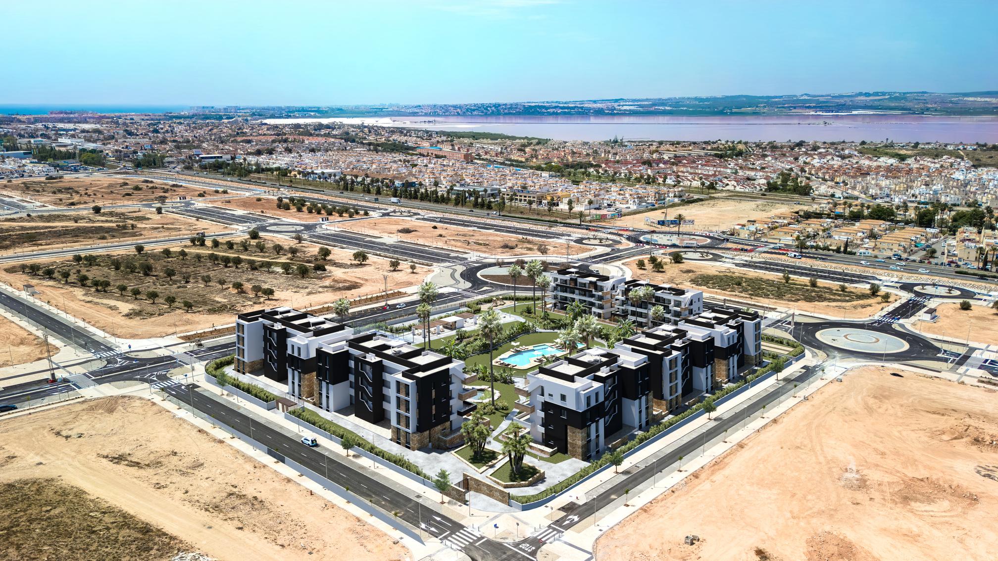 Children's playground with play equipment in new-build development, El Chaparral, Torrevieja