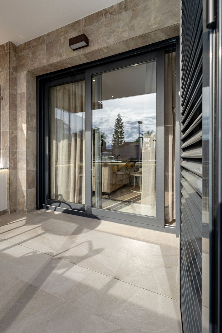 Building entrance and communal lobby, Playa del Cura
