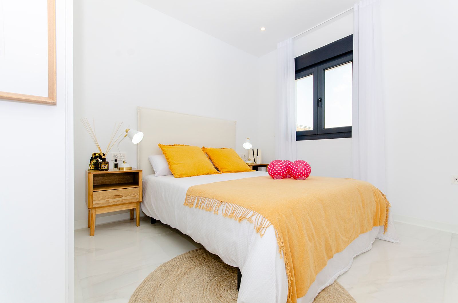 Bedroom window overlooking garden in new-build townhouse, Vistabella, Orihuela