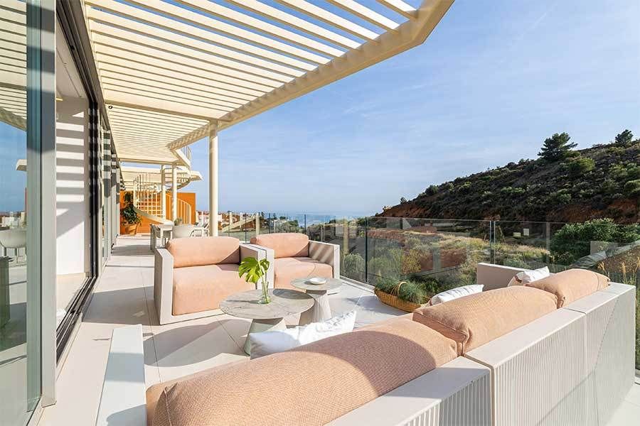 Living room with full-height glazing and terrace access, new-build villa, Reserva del Higuerón