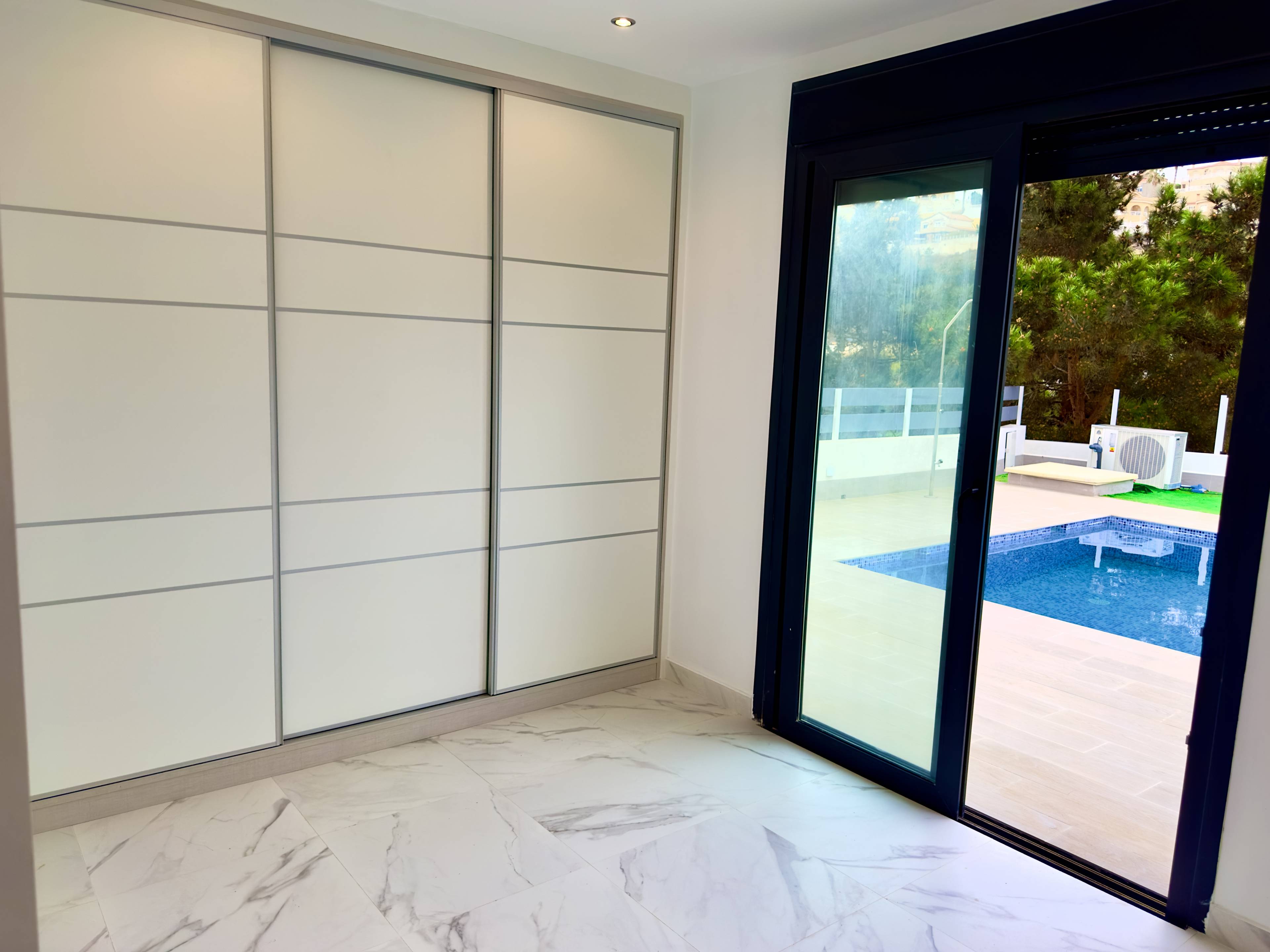 Rooftop solarium with open sky above new-build villa, La Marquesa