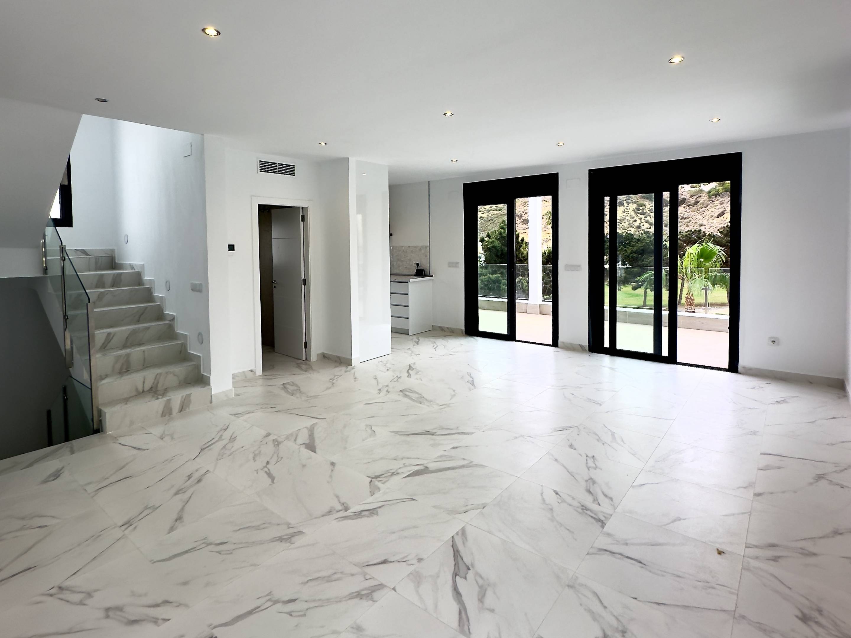 Dining space in open-plan area of new-build villa, La Marquesa