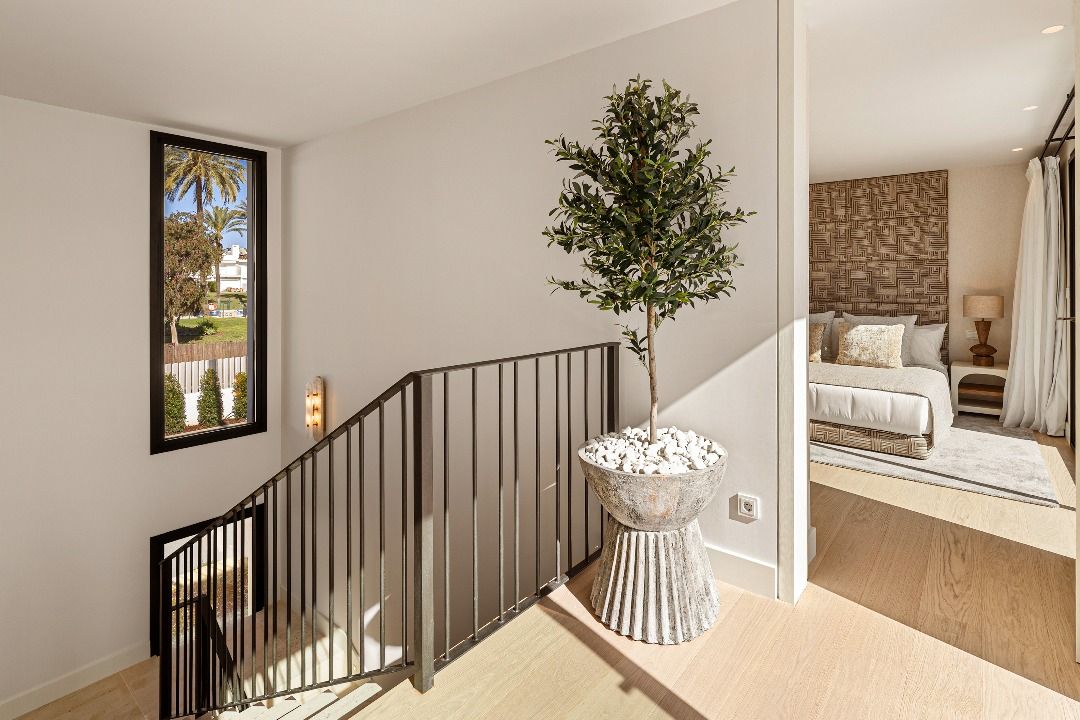 Glazed terrace doors open to garden, new-build villa in Aloha