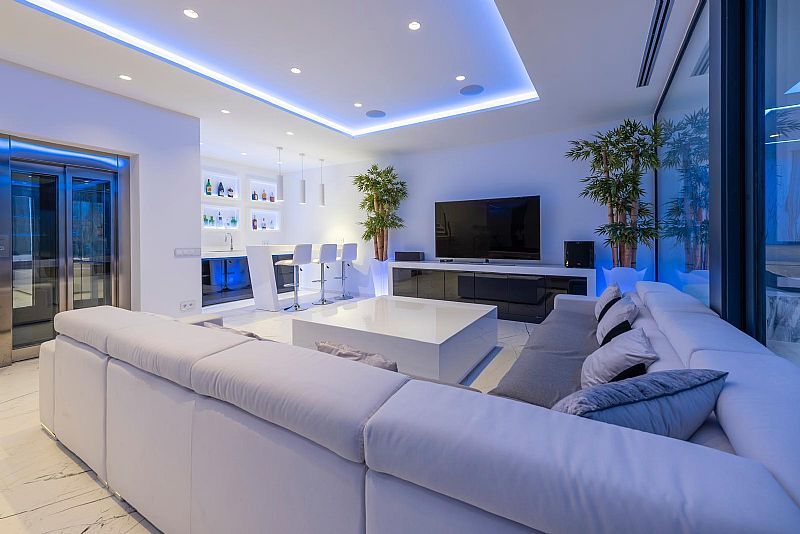 Living room with full-height glazed doors to terrace in new-build villa, Manzanera, Calpe