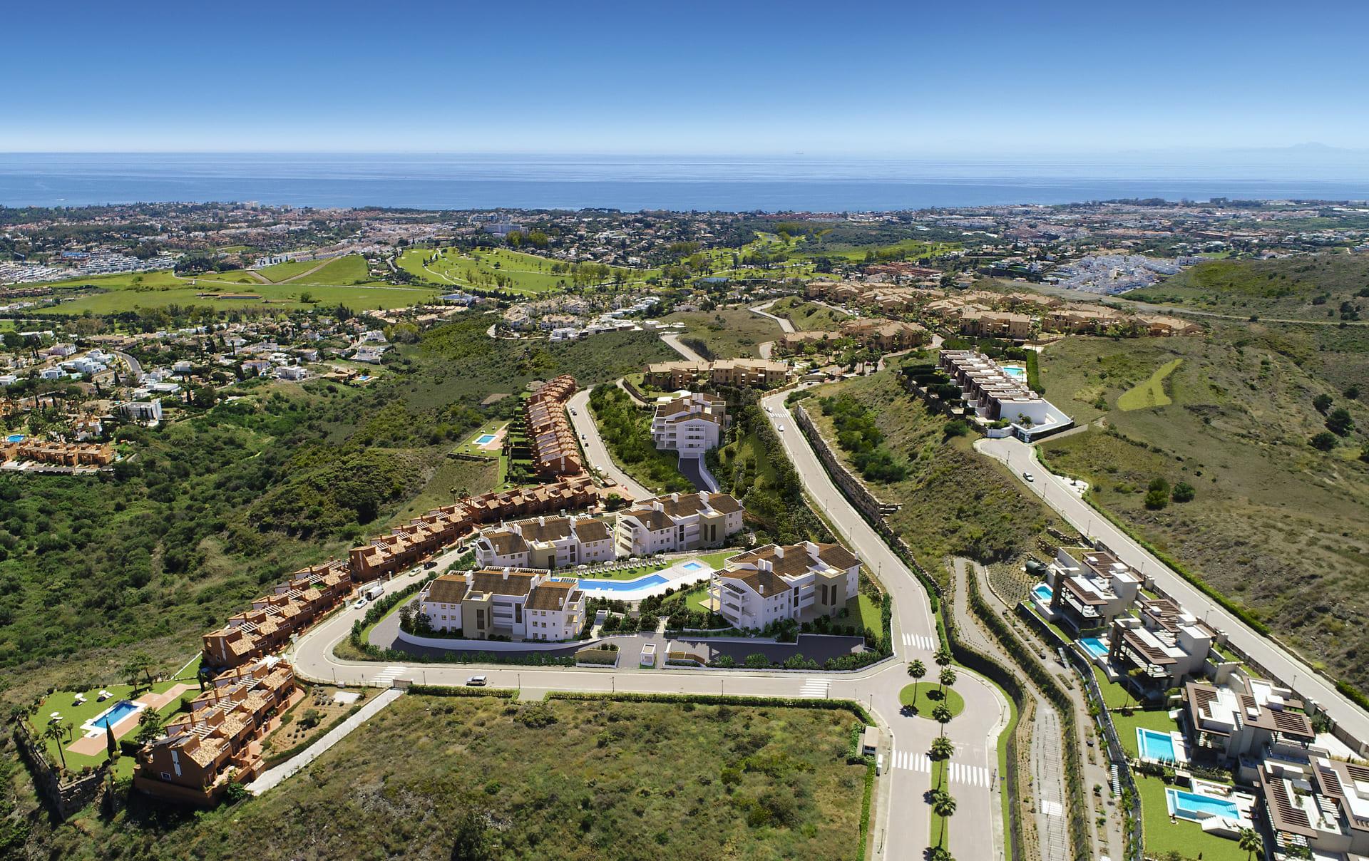 Open-plan kitchen and dining area with fitted units in new-build apartment, El Paraíso, Benahavis