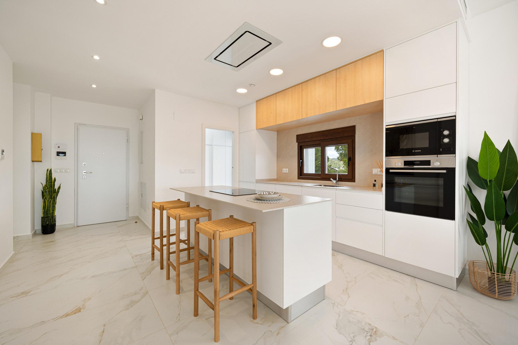 Kitchen worktop and upper cabinetry detail in new-build villa, Pla de Cantal