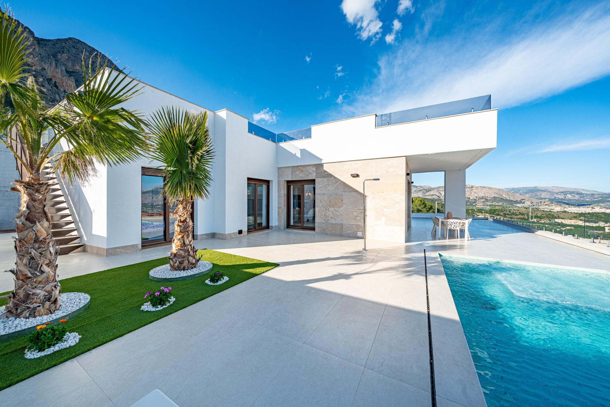 Exterior of new-build villa in evening light, Pla de Cantal, Polop