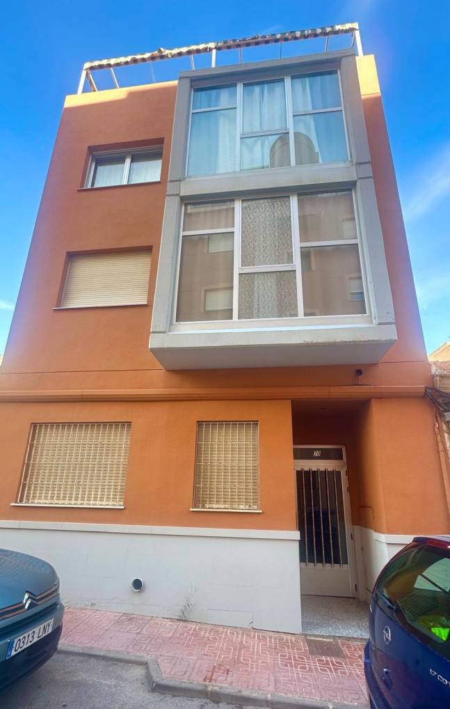 Open-plan kitchen with integrated appliances in ground-floor apartment, La Mata Pueblo