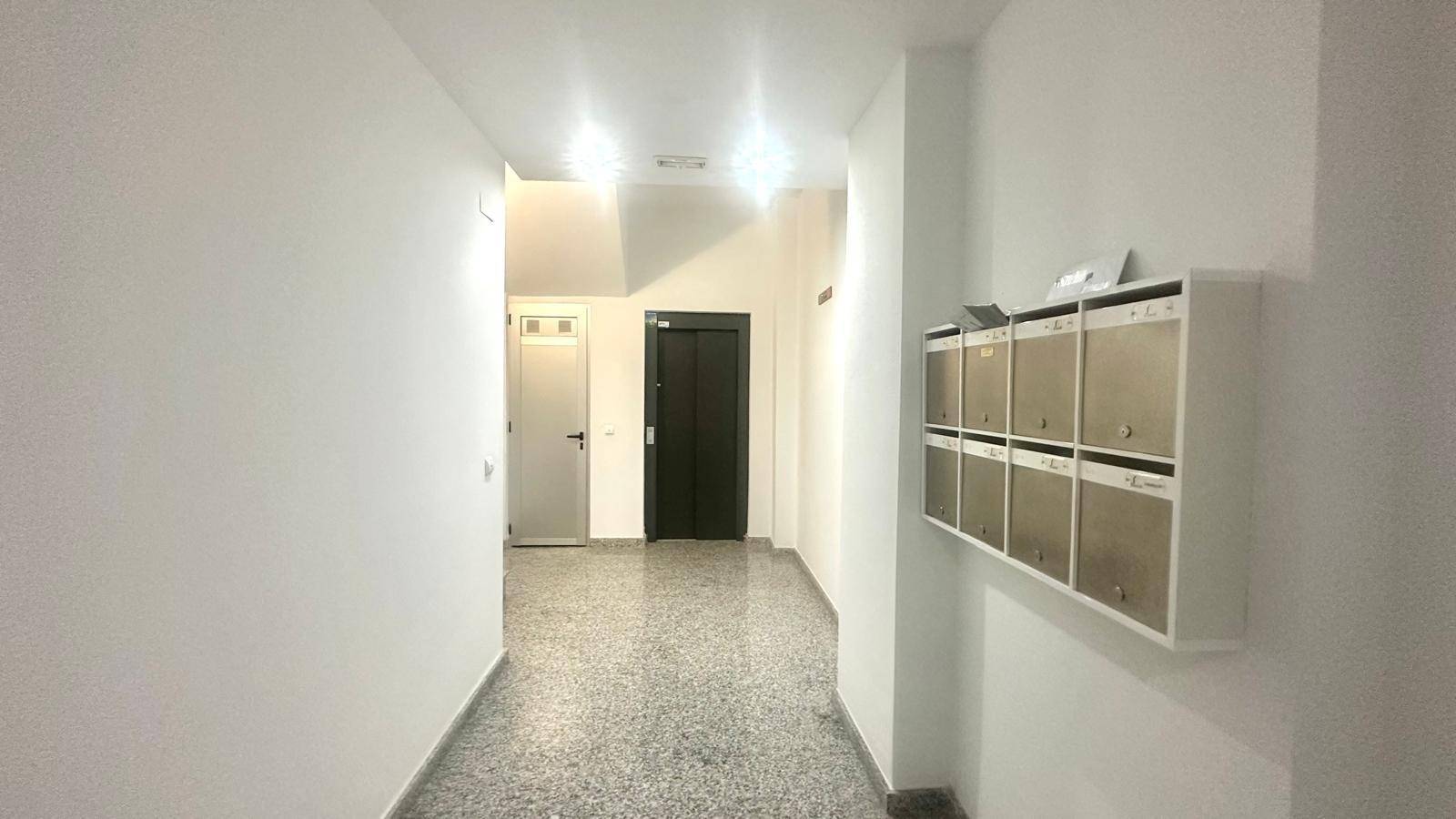 Entrance hallway with video intercom panel in apartment, La Mata Pueblo, Torrevieja
