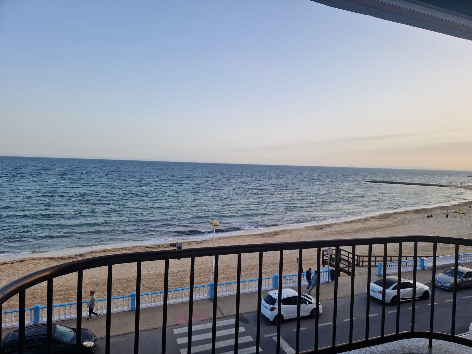 Dining area adjacent to living room in 3-bedroom apartment, Playa de los Locos, Torrevieja