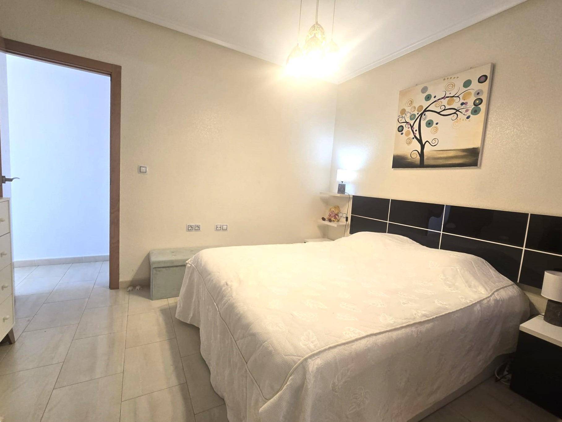 Kitchen worktop and storage cupboards in ground-floor apartment, Centro, Torrevieja