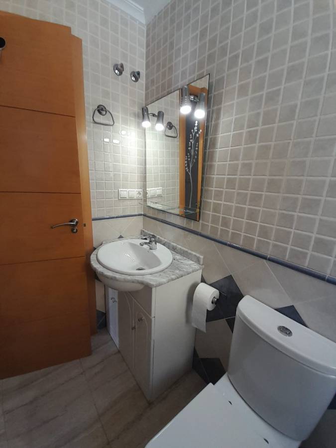 Enclosed gallery with sliding windows in detached villa, Lo Marabú