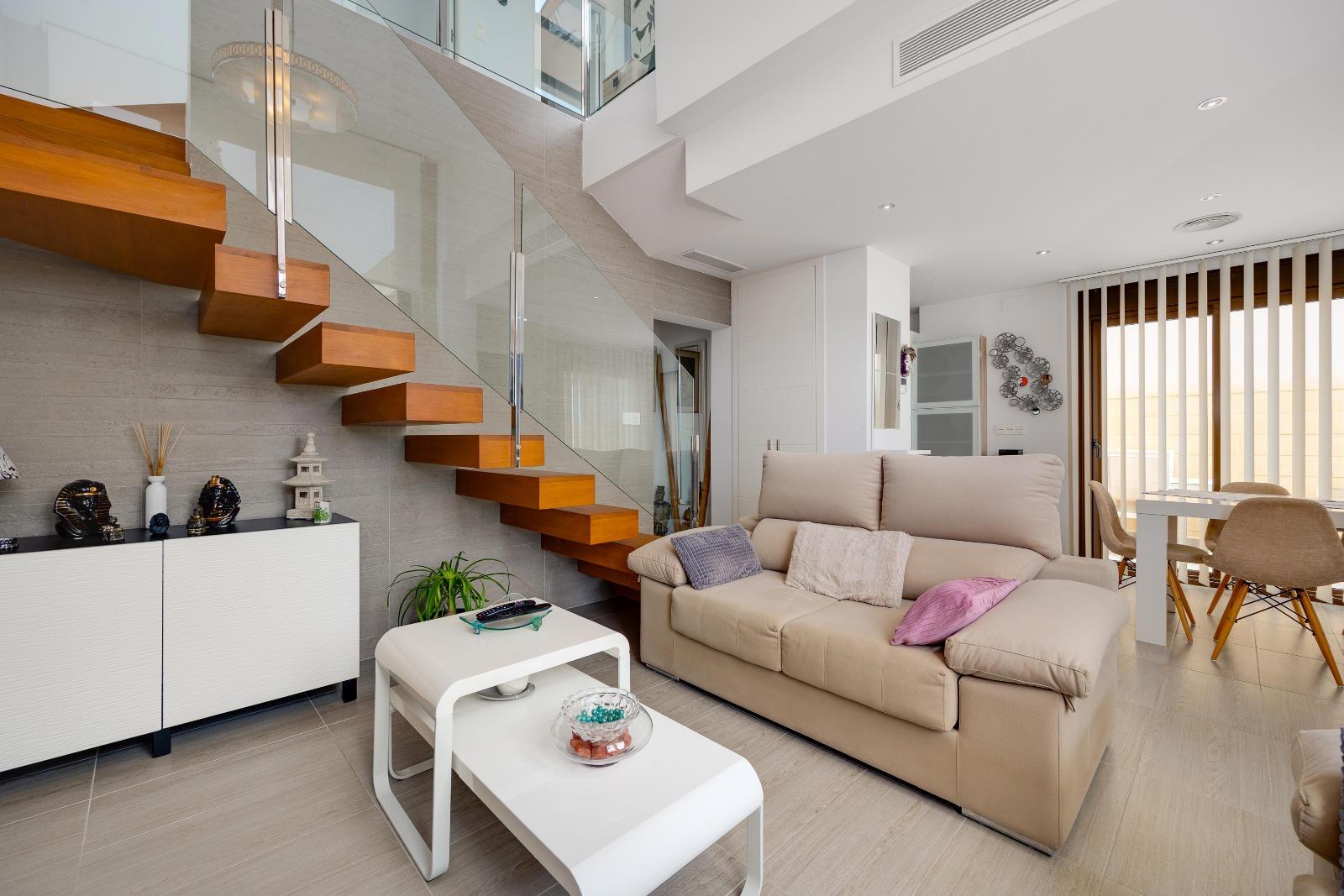 Living area with patio doors to terrace, villa in Pueblo Bravo