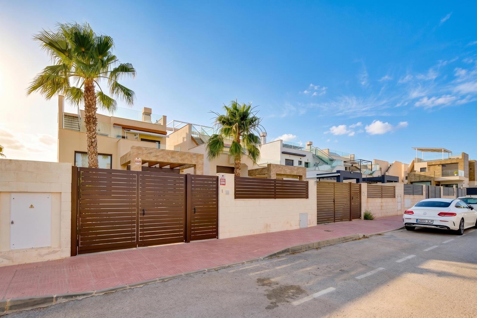 Exterior front facade and parking area, 3-bedroom villa, Pueblo Bravo