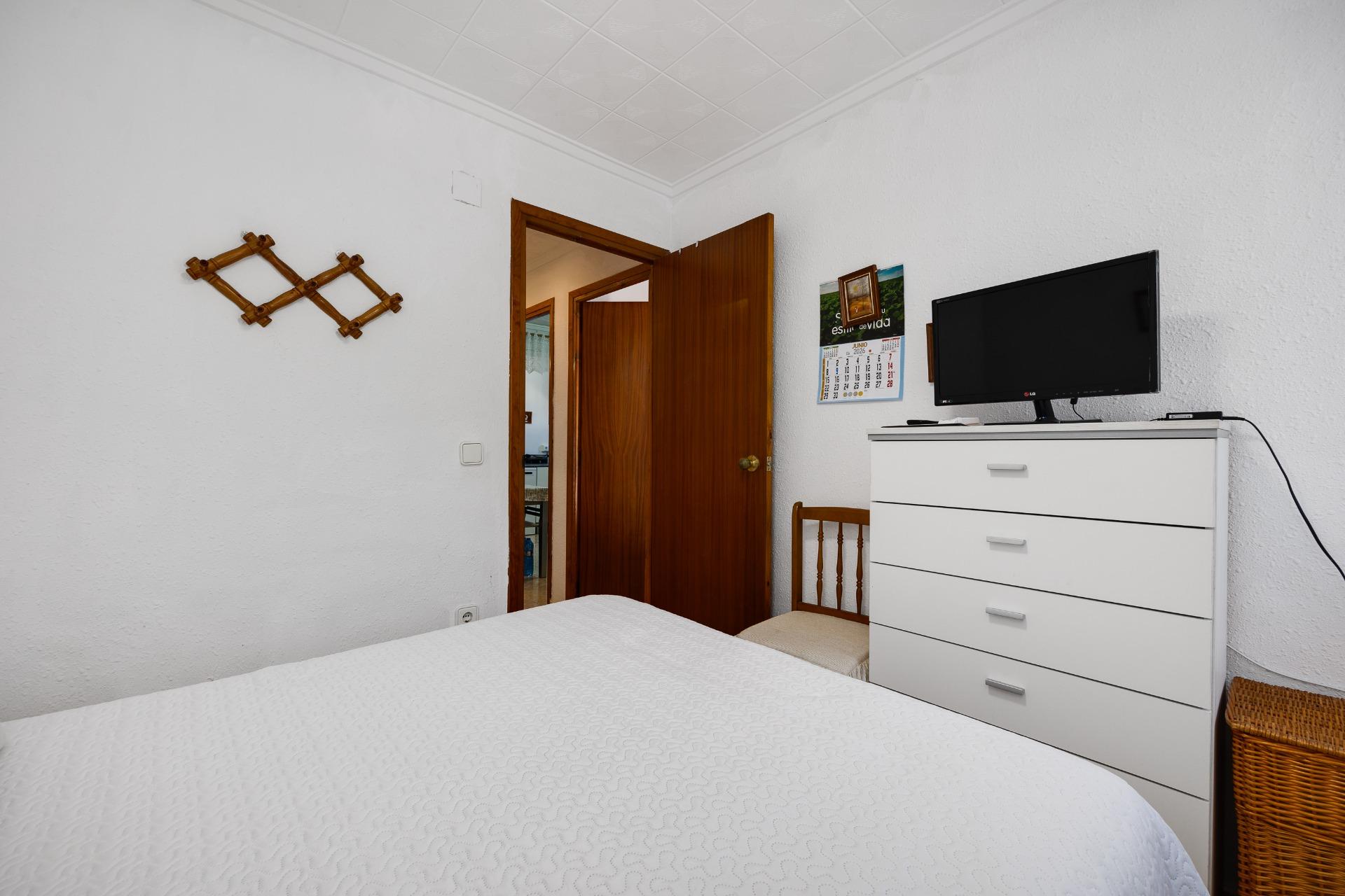 Street-facing exterior and access of villa in Torretas, Torrevieja
