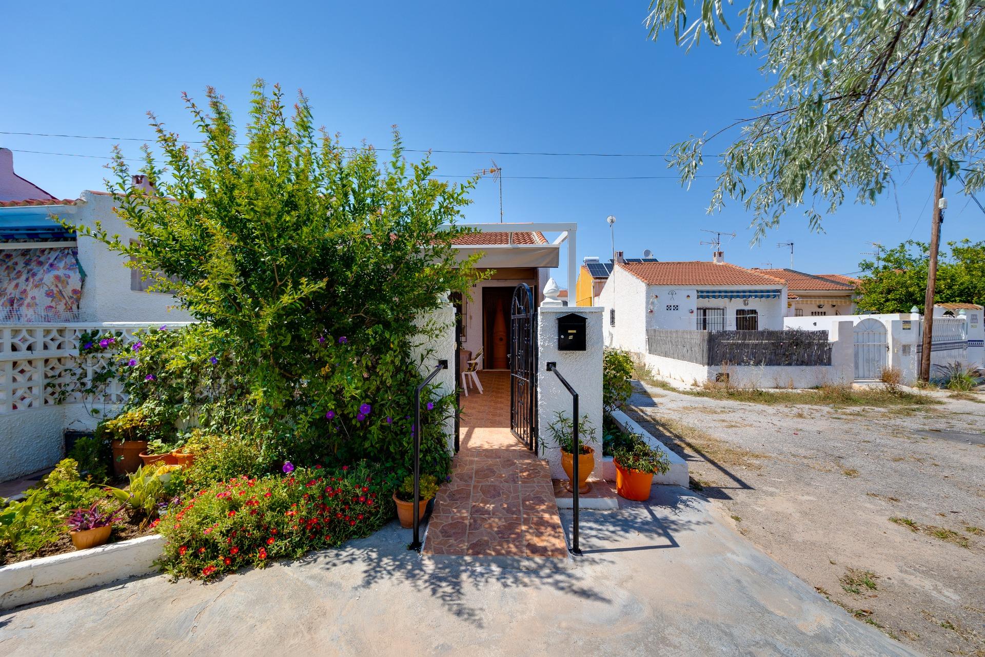 Private garden viewed from living room access door, Torretas villa